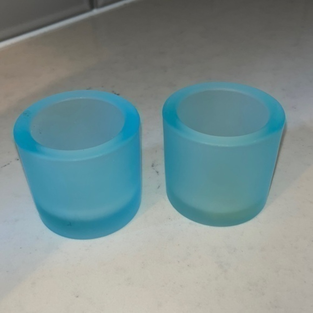 Pottery barn tea light holders . 2 1/2 inches x 2 1/2 inches . Sea glass blue